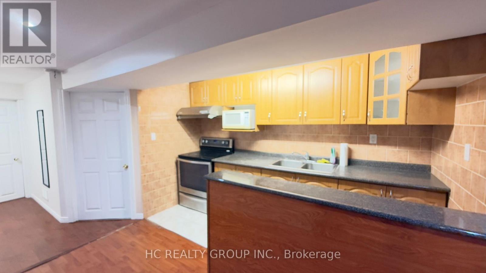 Basement - 52 Lakespring Drive, Markham, ON - Indoor Photo Showing Kitchen With Double Sink