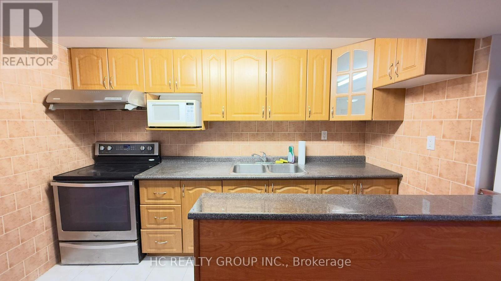 Basement - 52 Lakespring Drive, Markham, ON - Indoor Photo Showing Kitchen With Double Sink