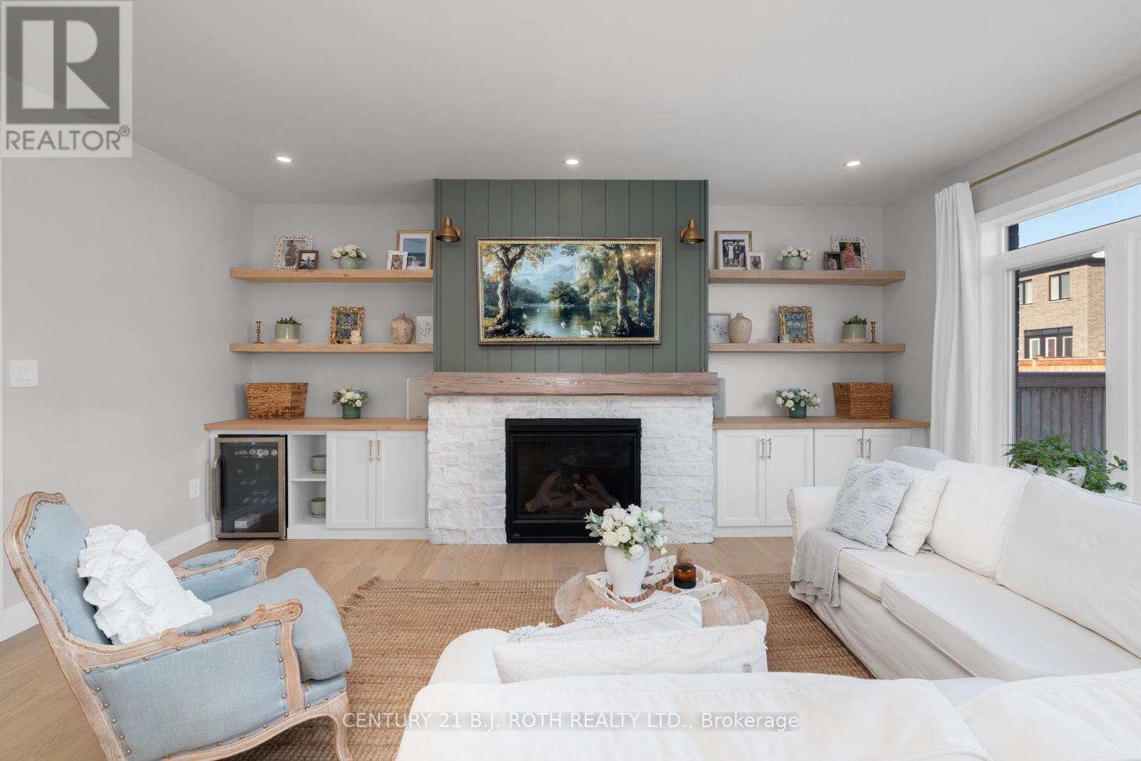 19 Rowley Crescent, Springwater, ON - Indoor Photo Showing Living Room With Fireplace