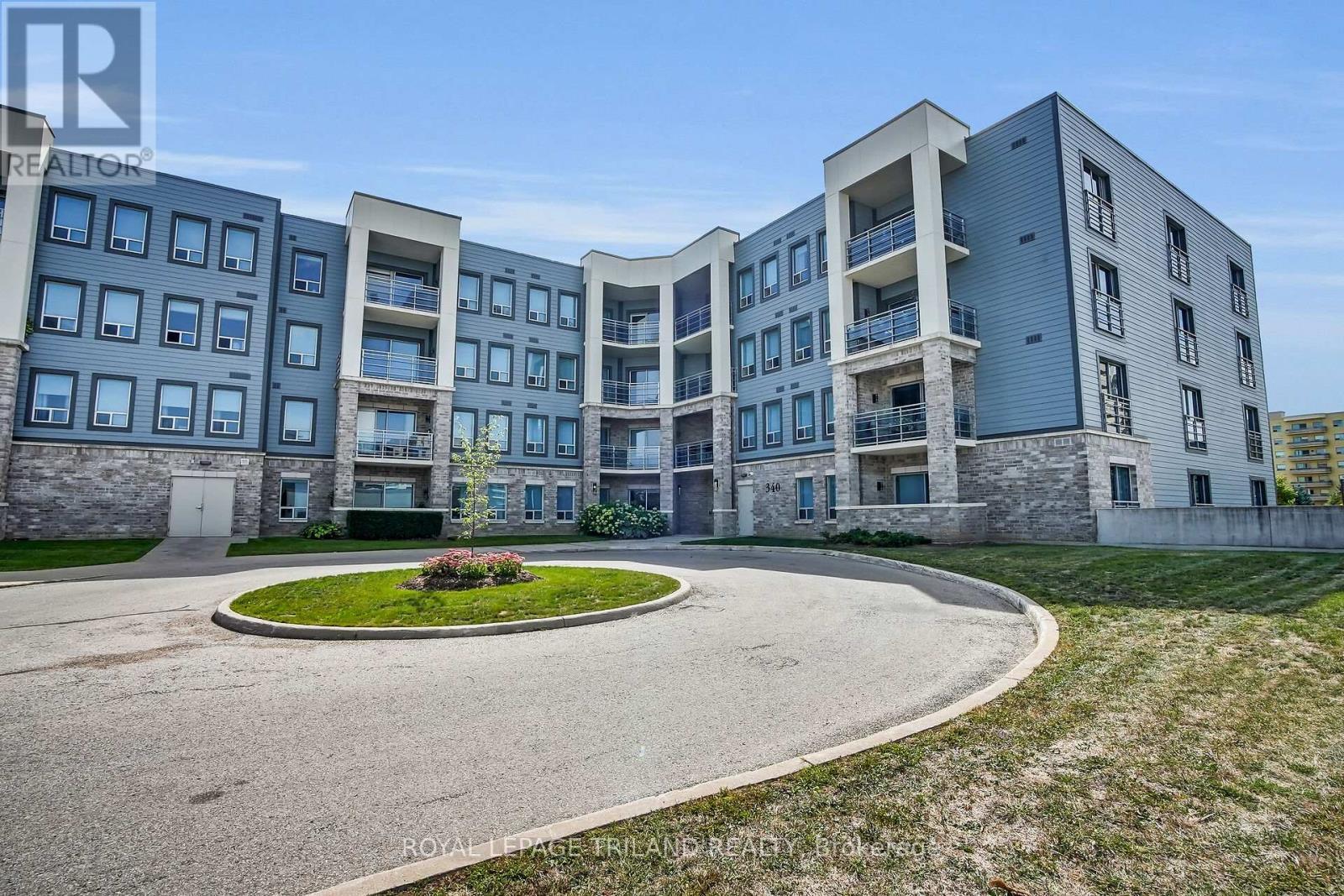 401 - 340 Sugarcreek Trail, London North (North N), ON - Outdoor With Balcony With Facade