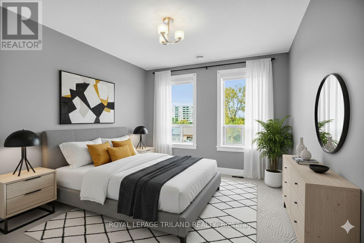 401 - 340 Sugarcreek Trail, London North (North N), ON - Indoor Photo Showing Bedroom