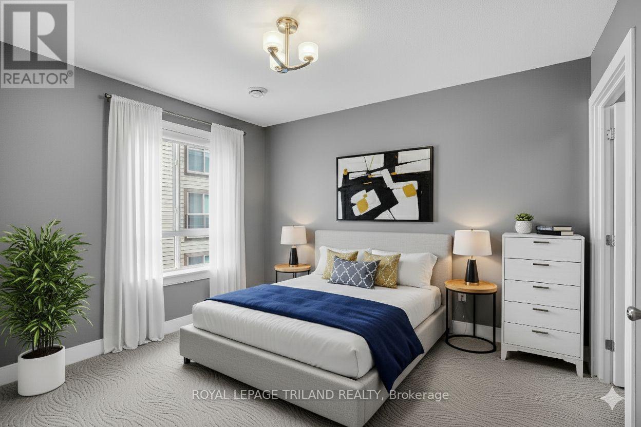 401 - 340 Sugarcreek Trail, London North (North N), ON - Indoor Photo Showing Bedroom