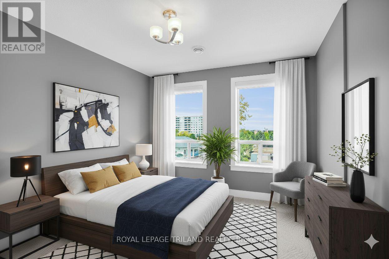 401 - 340 Sugarcreek Trail, London North (North N), ON - Indoor Photo Showing Bedroom