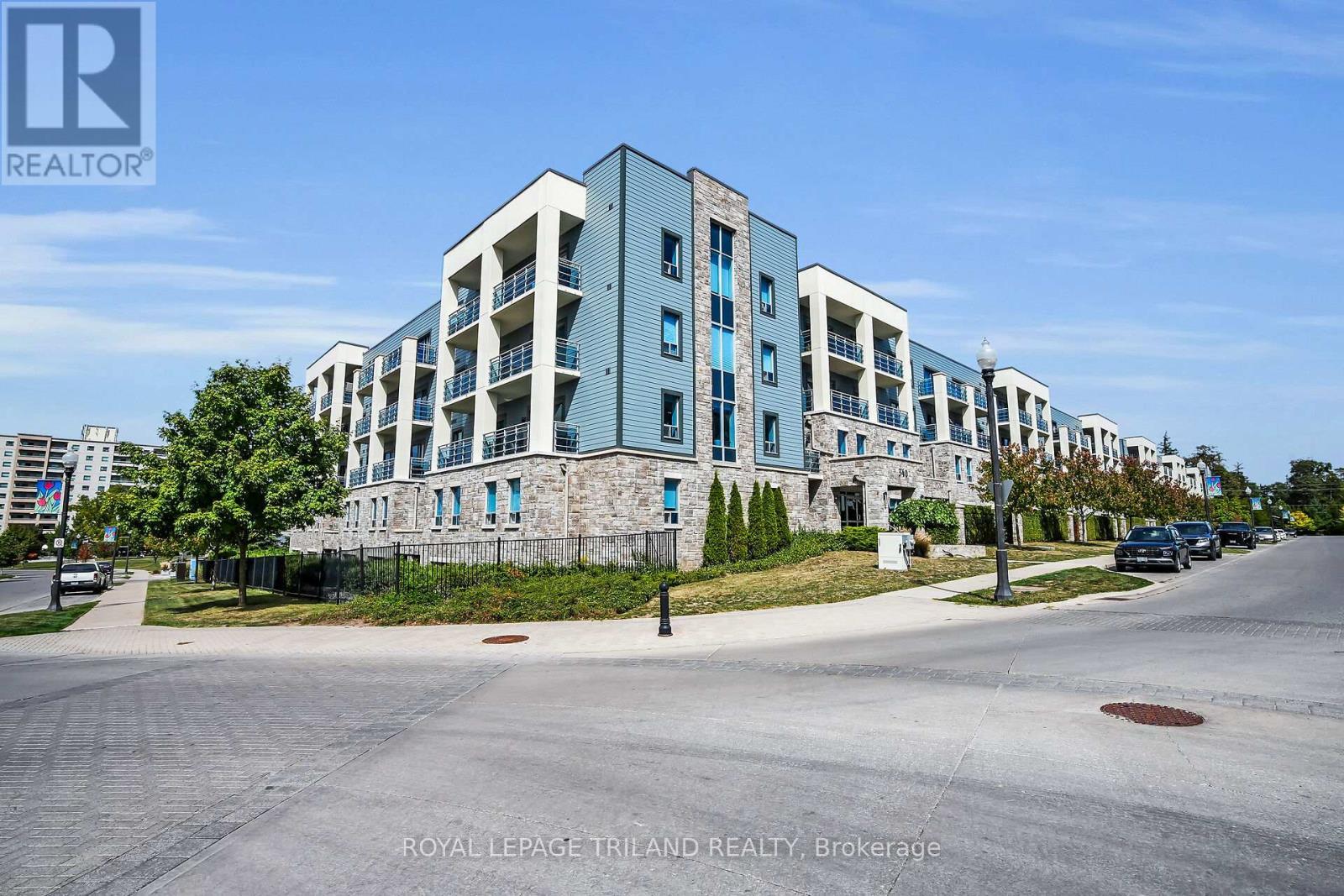 401 - 340 Sugarcreek Trail, London North (North N), ON - Outdoor With Facade