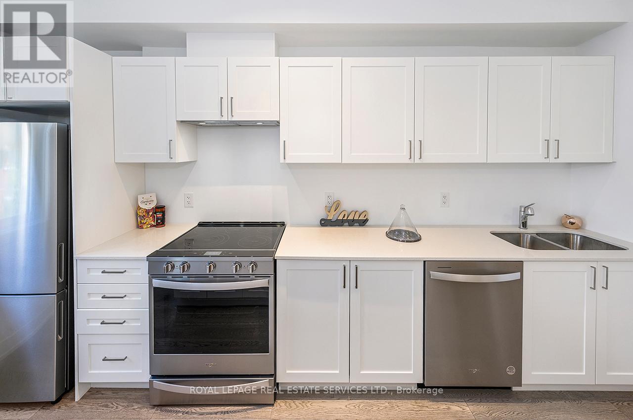 251 - 1075 Douglas Mccurdy Common, Mississauga, ON - Indoor Photo Showing Kitchen With Stainless Steel Kitchen With Double Sink