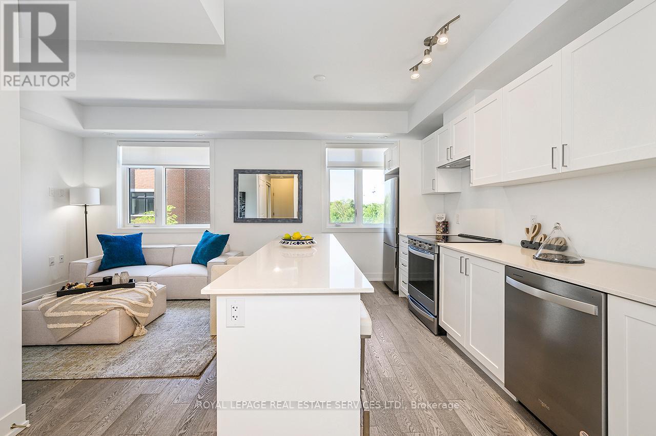 251 - 1075 Douglas Mccurdy Common, Mississauga, ON - Indoor Photo Showing Kitchen