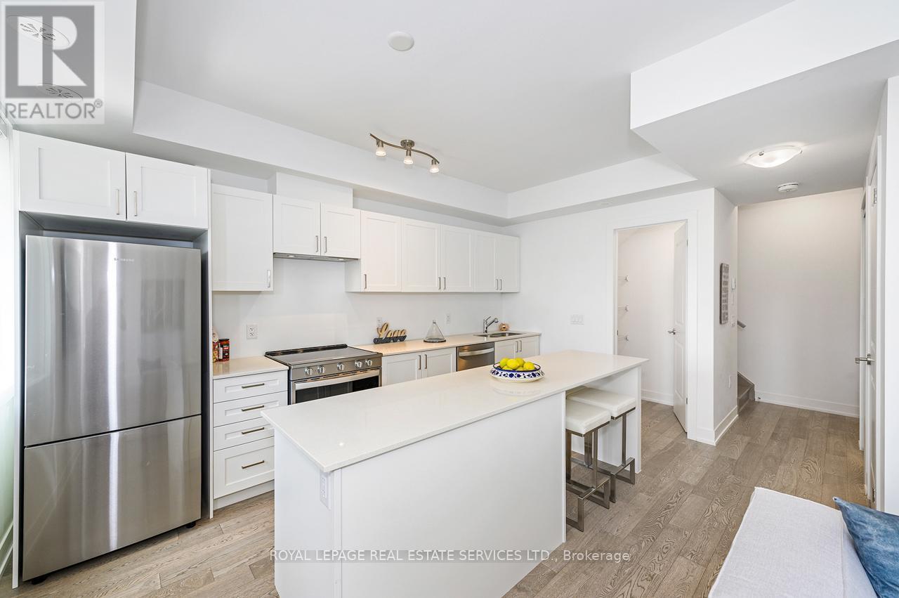 251 - 1075 Douglas Mccurdy Common, Mississauga, ON - Indoor Photo Showing Kitchen With Stainless Steel Kitchen With Upgraded Kitchen