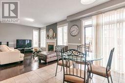 4 Bassett Crescent, Brampton, ON - Indoor Photo Showing Living Room With Fireplace