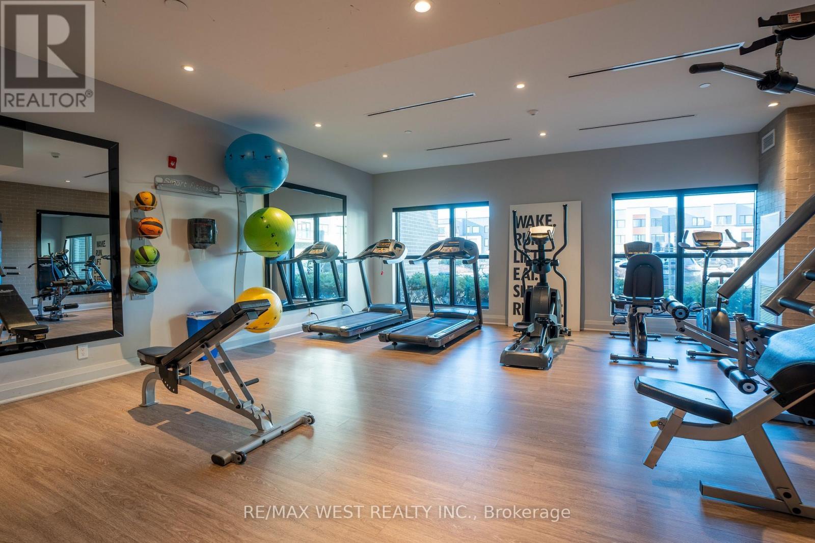 133 - 102 Grovewood Common, Oakville, ON - Indoor Photo Showing Gym Room
