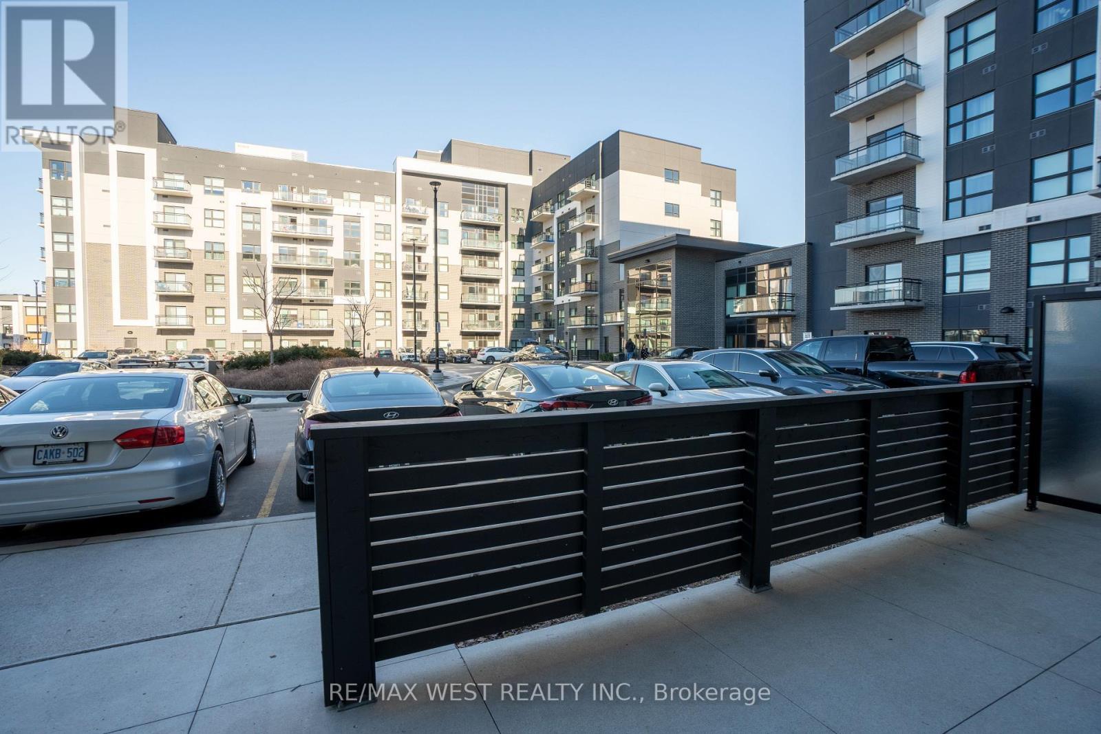 133 - 102 Grovewood Common, Oakville, ON - Outdoor With Facade