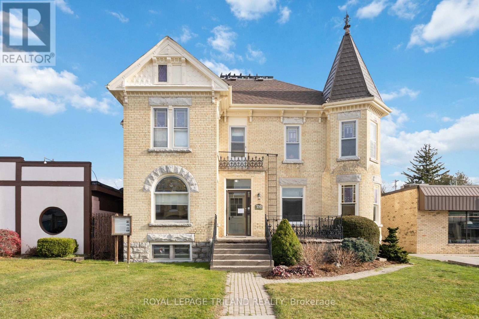 Street side view with fresh paint and updates - 250 Main Street, North Middlesex (Parkhill), ON