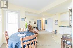 2 bed upper apt:dining and living -