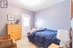 2 bed upper apt: bedroom with fire escape -