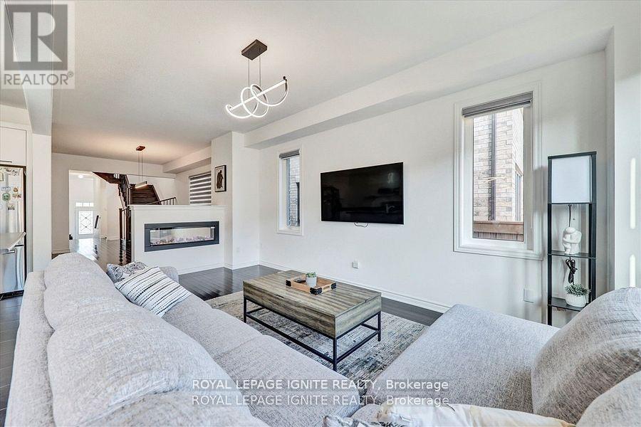 35 Peter Hogg Court, Whitby, ON - Indoor Photo Showing Living Room With Fireplace