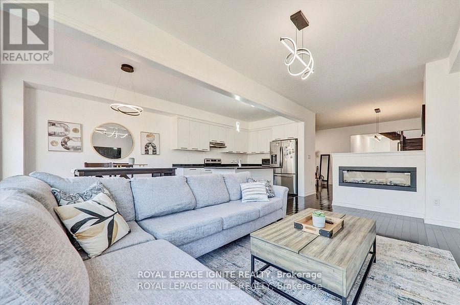 35 Peter Hogg Court, Whitby, ON - Indoor Photo Showing Living Room With Fireplace