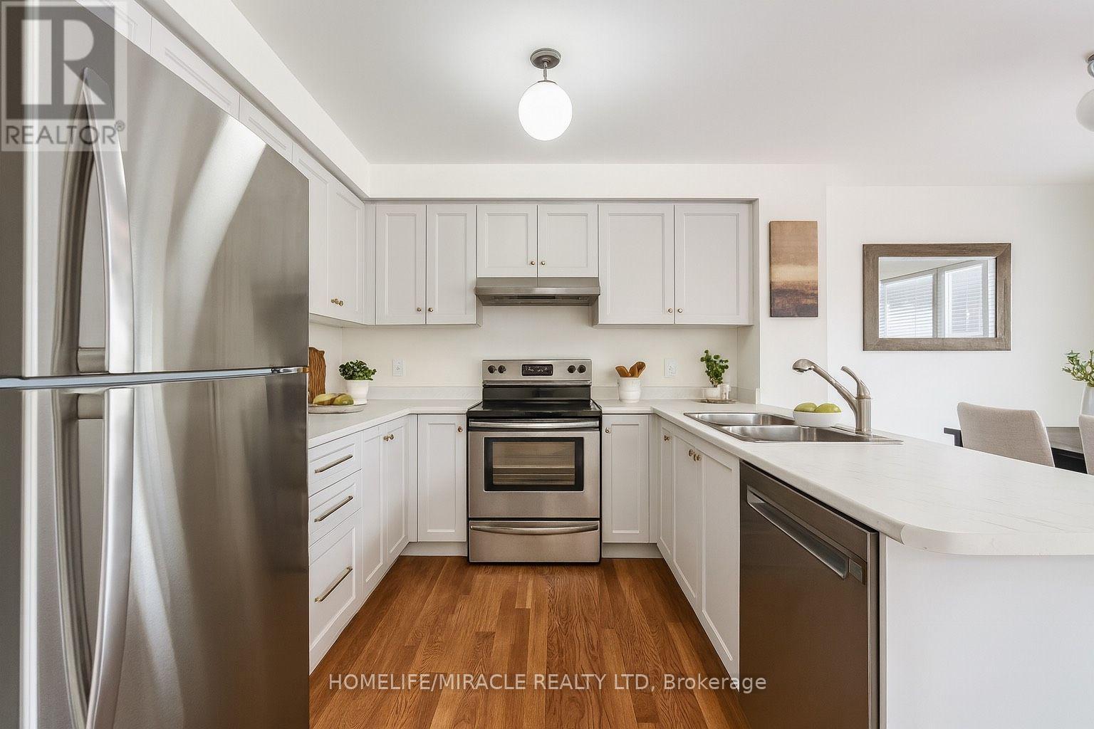 9 Trumpet Valley Boulevard, Brampton, ON - Indoor Photo Showing Kitchen With Double Sink