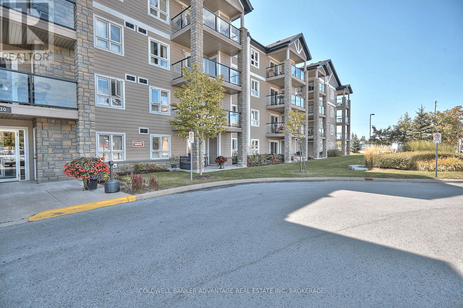 1204 - 330 Prince Charles Drive S, Welland (Broadway), ON - Outdoor With Balcony With Facade