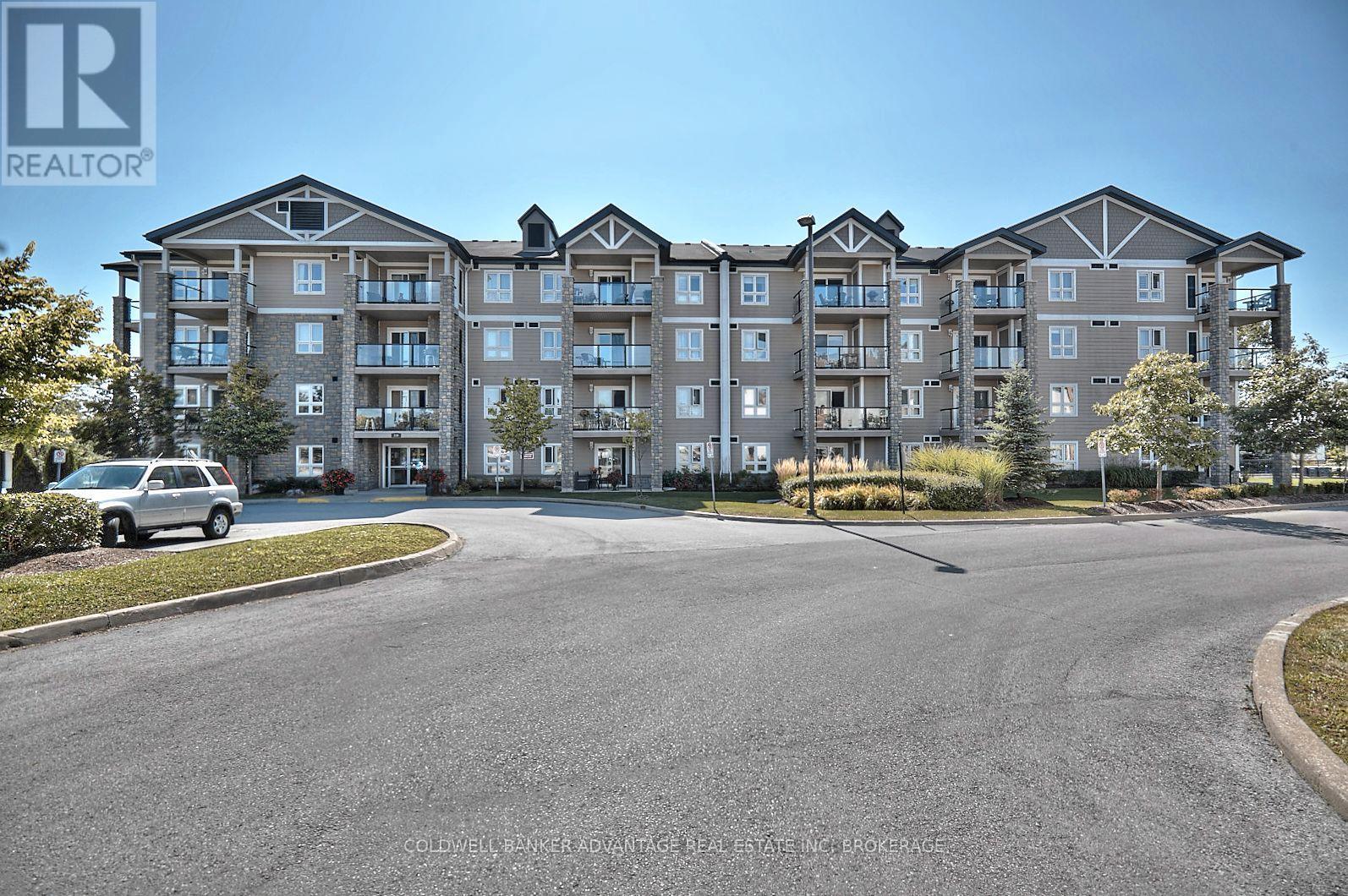 1204 - 330 Prince Charles Drive S, Welland (Broadway), ON - Outdoor With Balcony With Facade