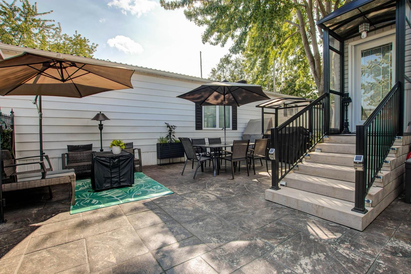 Backyard - 250-3950 Boul. Sir-Wilfrid-Laurier, Longueuil (Saint-Hubert), QC - Outdoor With Deck Patio Veranda With Exterior