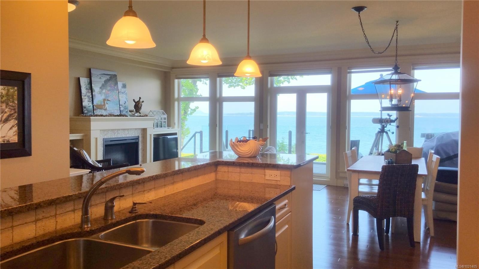 102-9115 Lochside Dr, North Saanich, BC - Indoor Photo Showing Kitchen With Fireplace With Double Sink