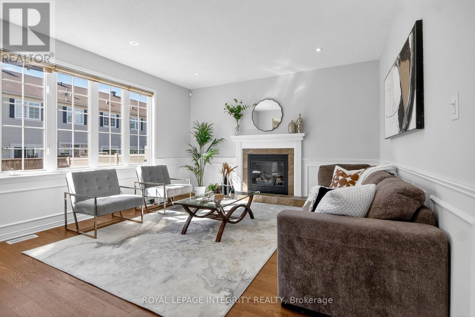 Family Room - 347 Tucana Way, Ottawa, ON - Indoor Photo Showing Living Room With Fireplace