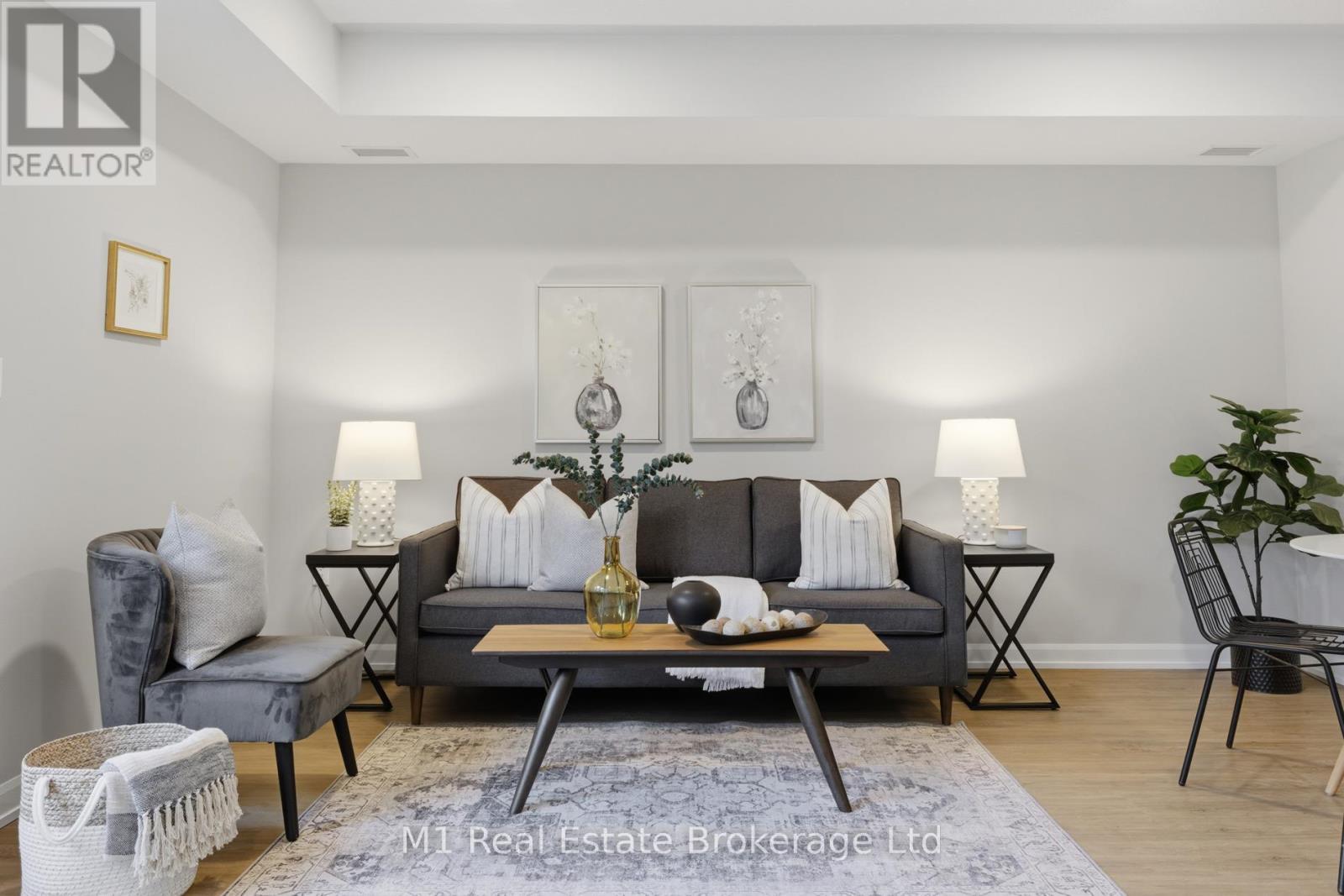 116 - 708 Woolwich Street, Guelph (Riverside Park), ON - Indoor Photo Showing Living Room