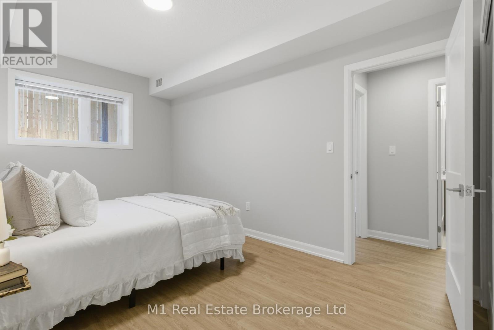 116 - 708 Woolwich Street, Guelph (Riverside Park), ON - Indoor Photo Showing Bedroom
