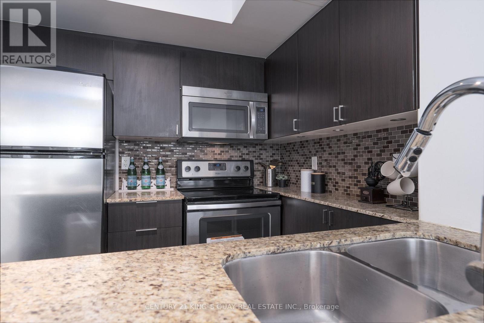 202 - 5740 Yonge Street, Toronto, ON - Indoor Photo Showing Kitchen With Double Sink With Upgraded Kitchen