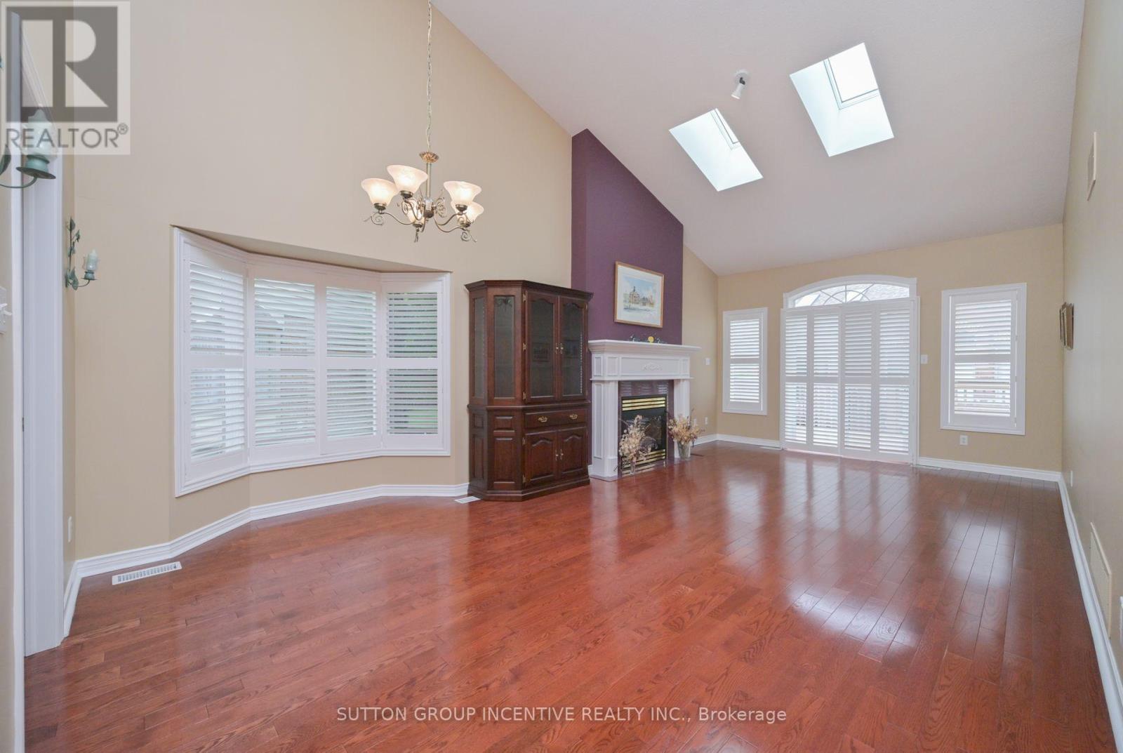 22 - 4 Belair Place, New Tecumseth, ON - Indoor With Fireplace