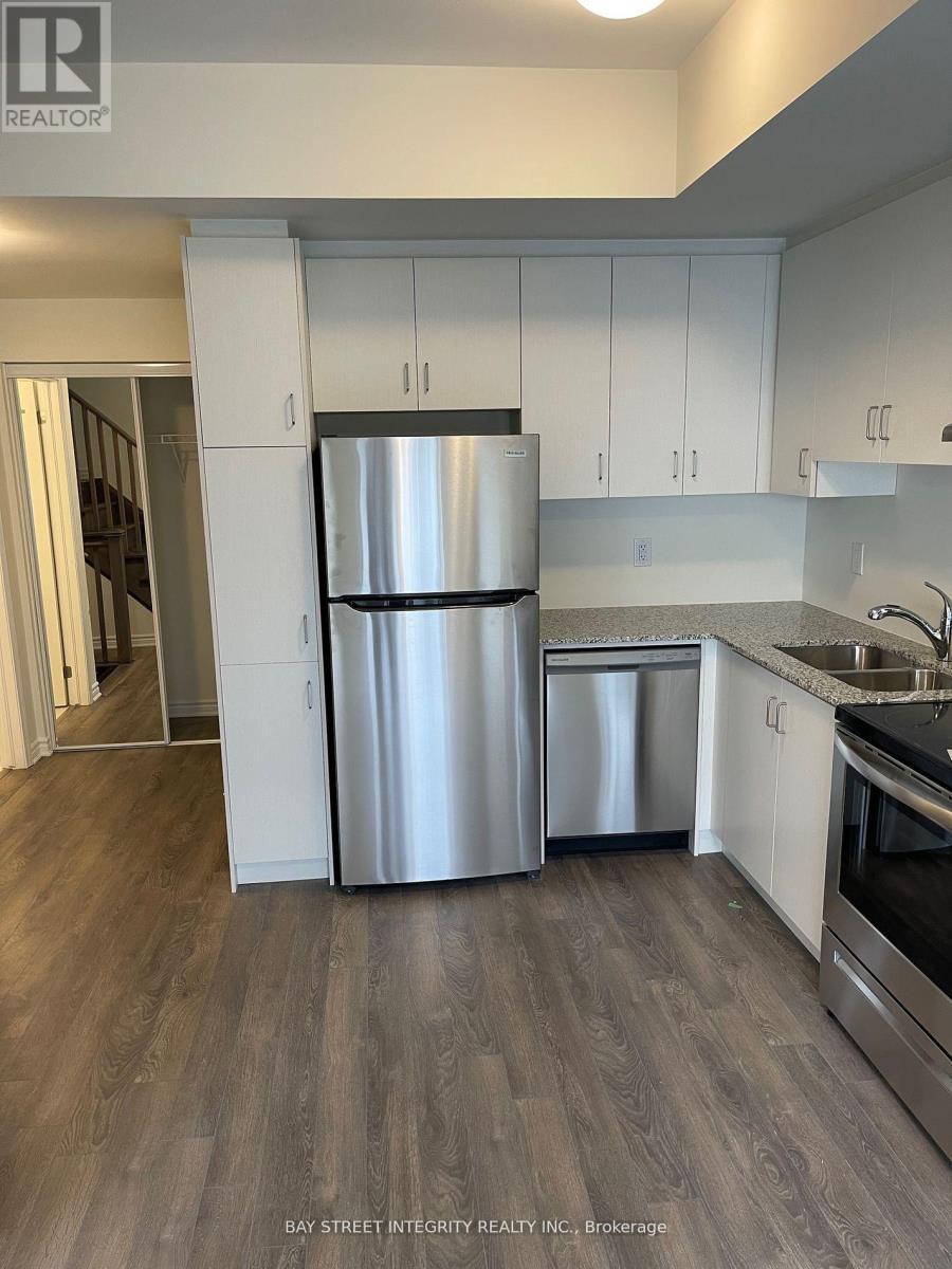 541 - 2791 Eglinton Avenue E, Toronto, ON - Indoor Photo Showing Kitchen With Double Sink