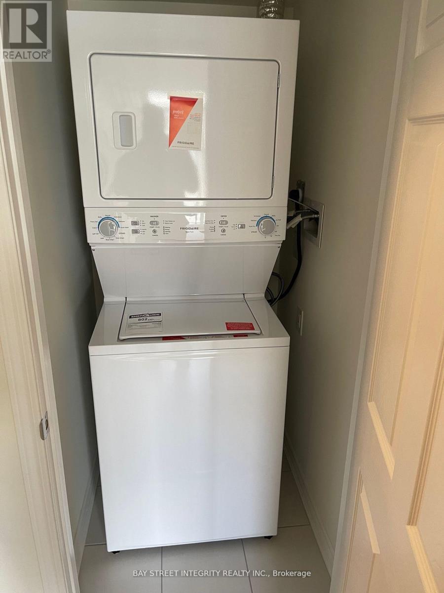 541 - 2791 Eglinton Avenue E, Toronto, ON - Indoor Photo Showing Laundry Room