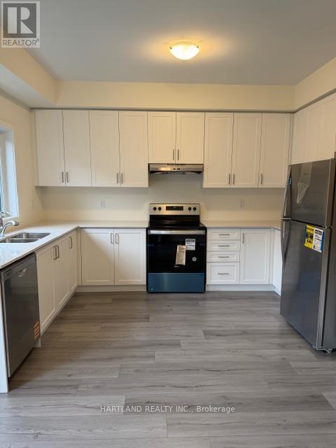501 - 1695 Dersan Street, Pickering, ON - Indoor Photo Showing Kitchen With Double Sink