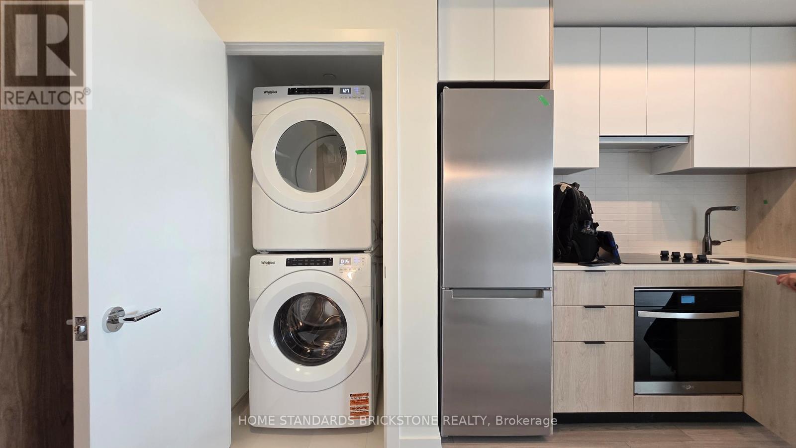 721 - 1007 The Queensway, Toronto, ON - Indoor Photo Showing Laundry Room