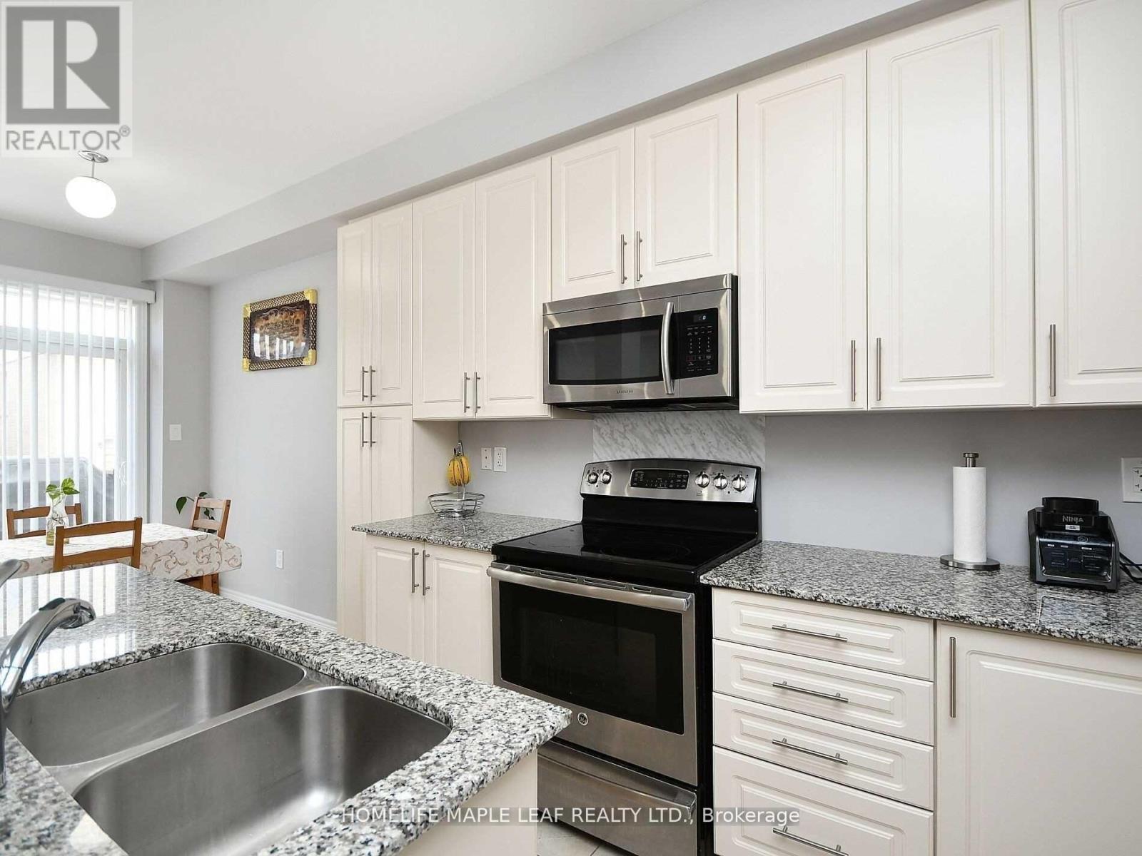76 Rockman Crescent, Brampton, ON - Indoor Photo Showing Kitchen With Double Sink