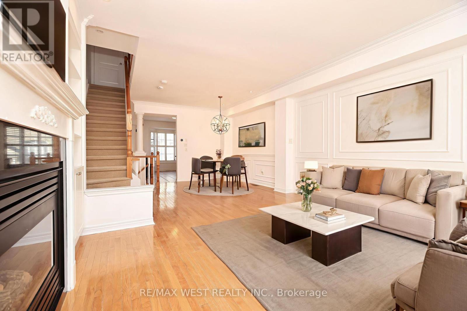 8 James Stock Path, Toronto, ON - Indoor Photo Showing Living Room With Fireplace