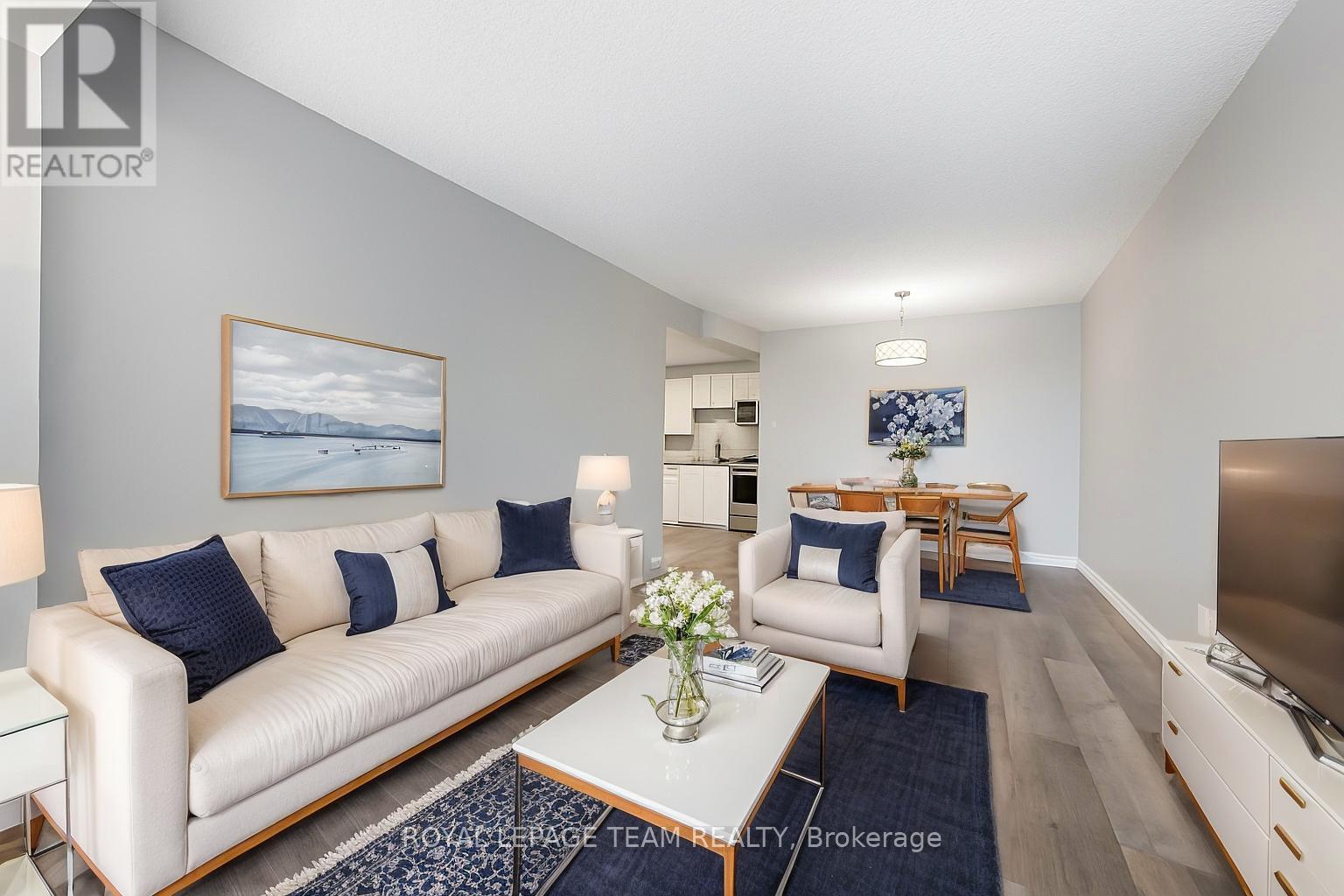 Modern style virtual enhancement - 901 - 200 Bay Street, Ottawa, ON - Indoor Photo Showing Living Room