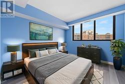 Primary Bedroom's virtually enhanced in this photo -