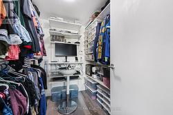 Walk-in Closet as is in it's ORIGINAL photo -