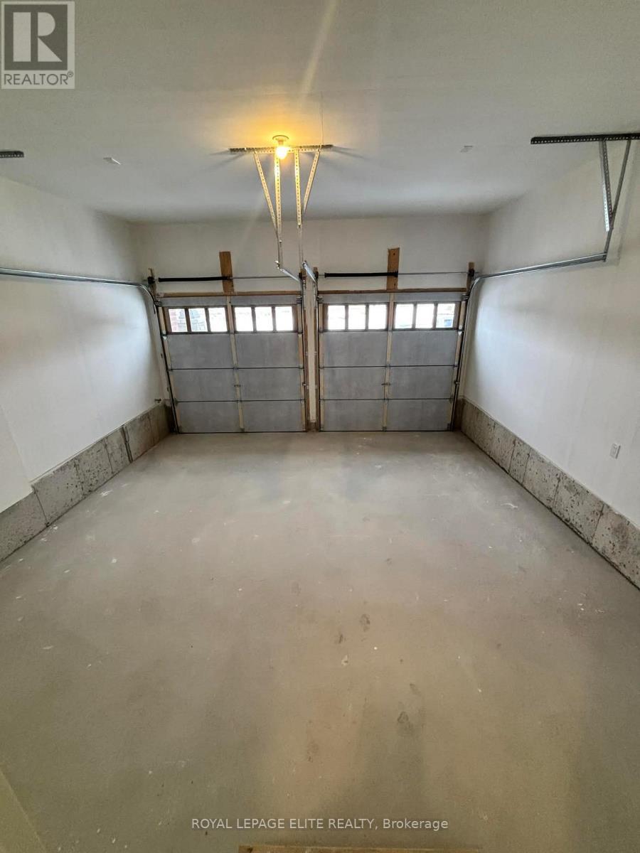 23 Addison Street, Caledon, ON - Indoor Photo Showing Garage