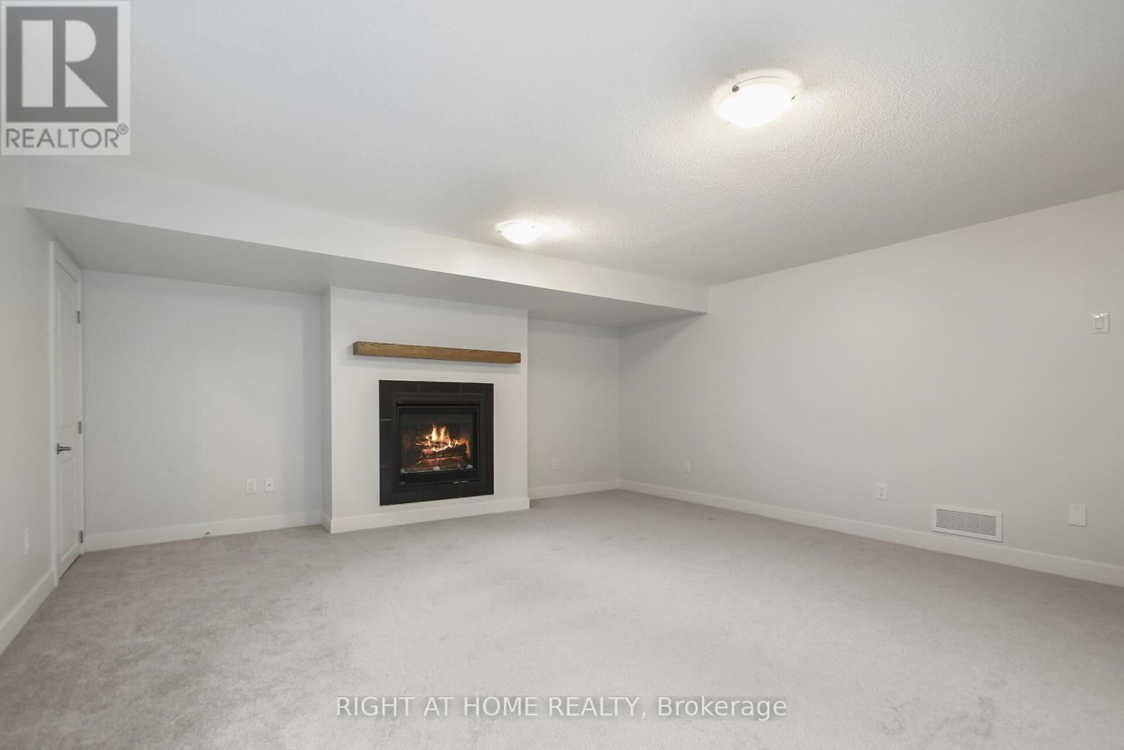 534 Corretto Place, Ottawa, ON - Indoor Photo Showing Other Room With Fireplace