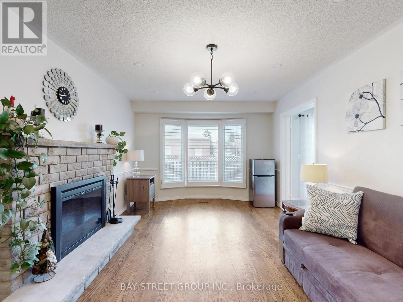 50 Greybeaver Trail, Toronto, ON - Indoor Photo Showing Living Room With Fireplace
