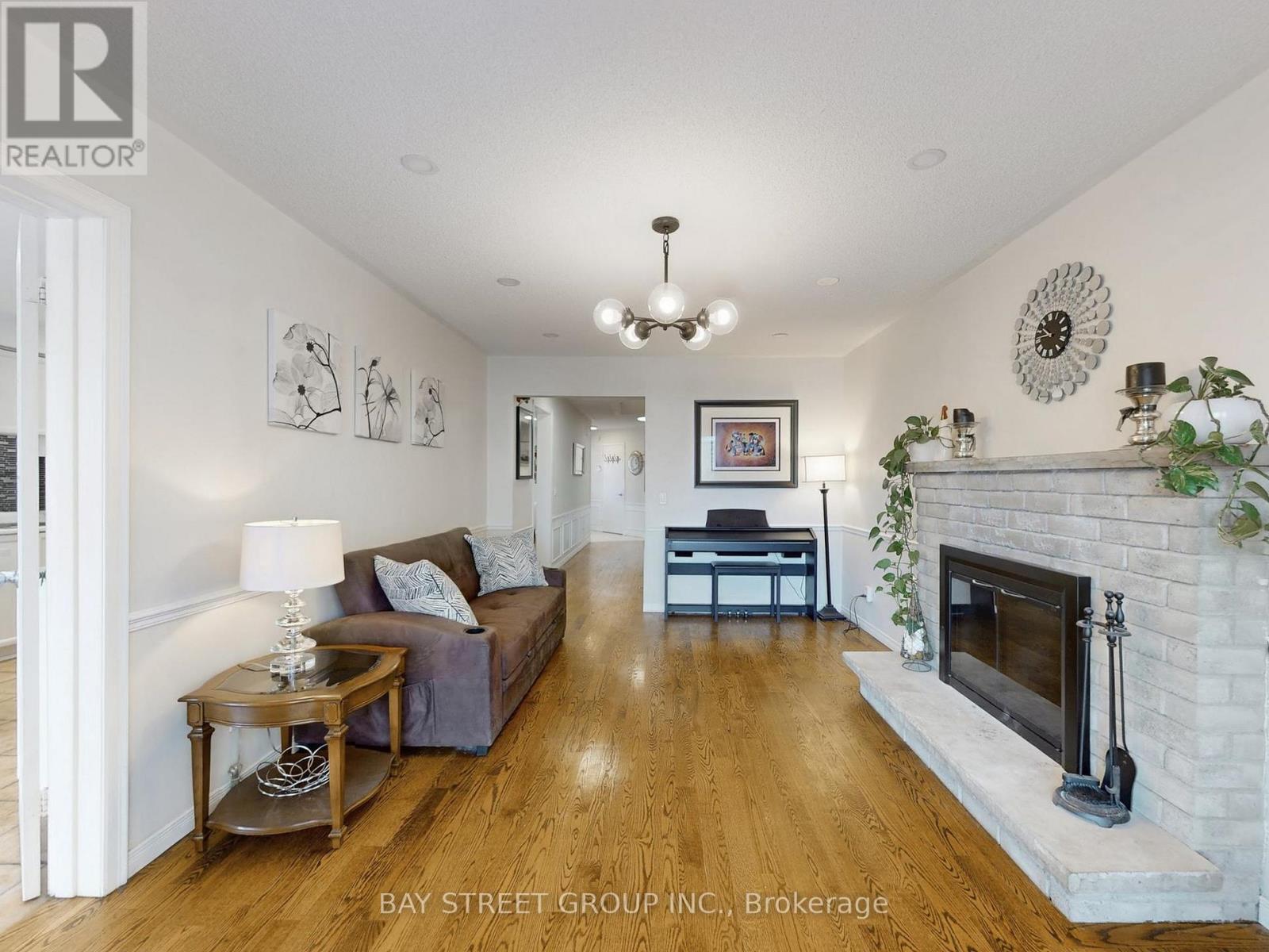 50 Greybeaver Trail, Toronto, ON - Indoor Photo Showing Living Room With Fireplace