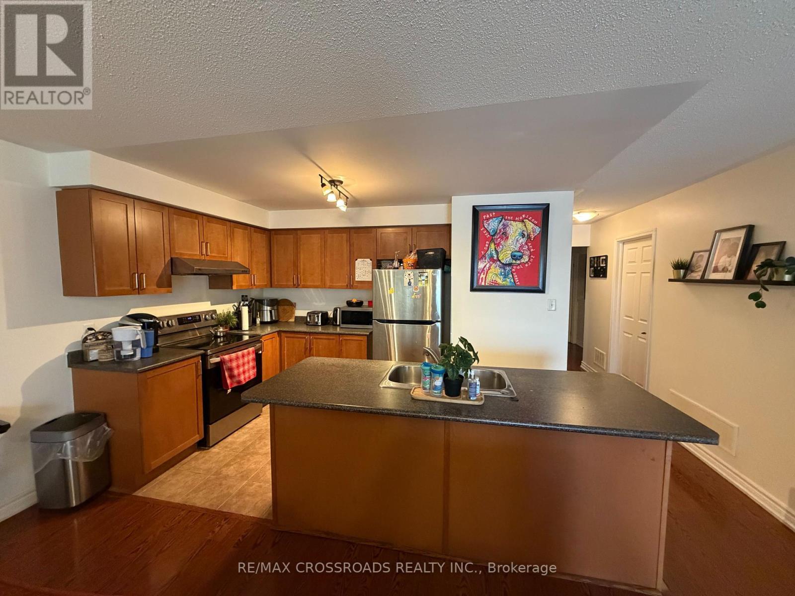 1 - 2709 Bur Oak Avenue, Markham, ON - Indoor Photo Showing Kitchen With Stainless Steel Kitchen
