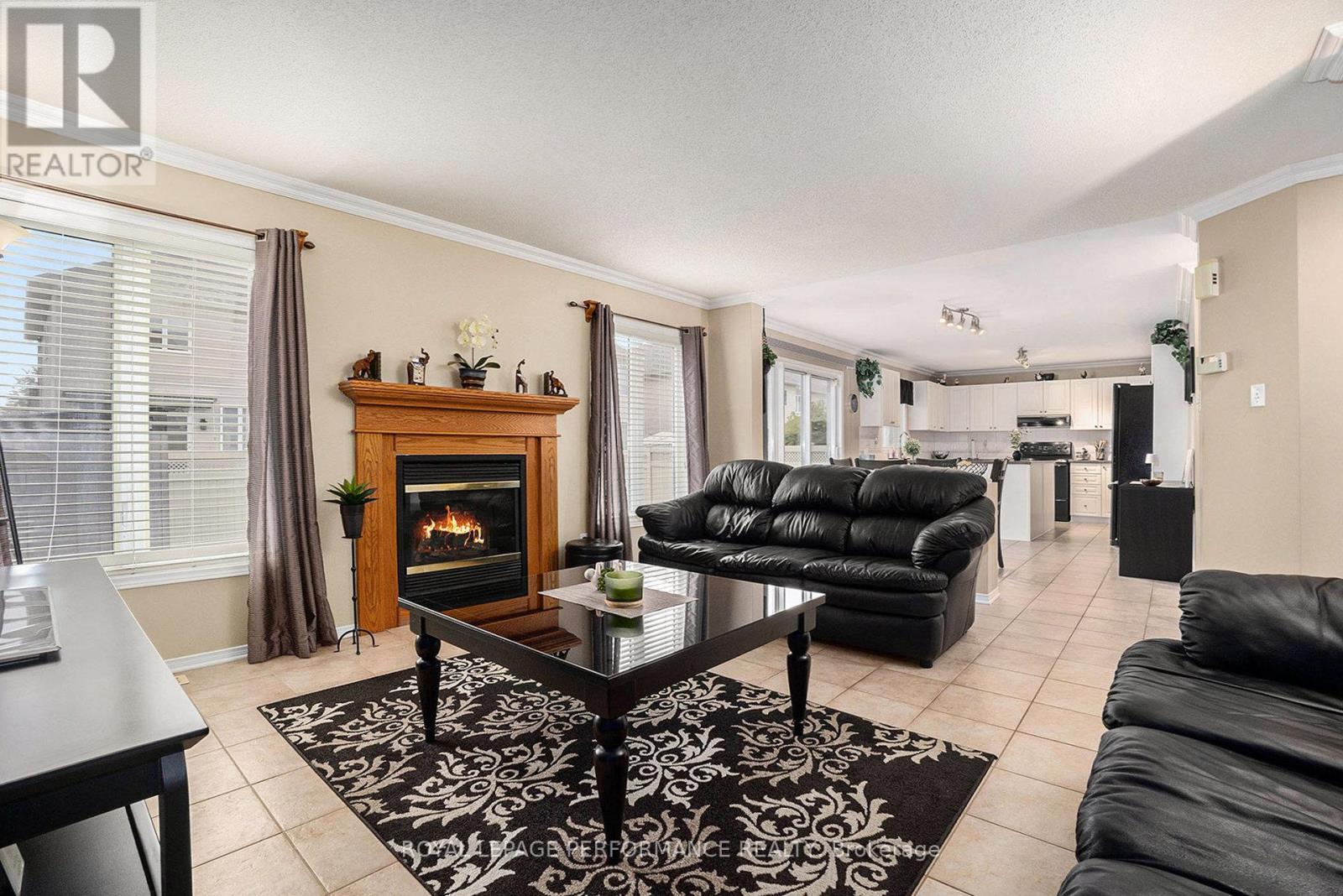 619 Chardonnay Drive, Ottawa, ON - Indoor Photo Showing Living Room With Fireplace