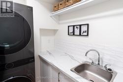 2nd floor laundry room with sink -