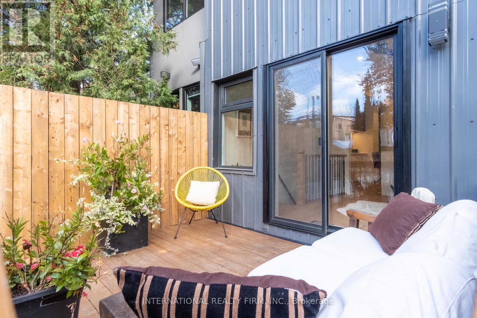 Walkout deck from kitchen on main floor - 46 Morse Street, Toronto, ON - Outdoor With Exterior