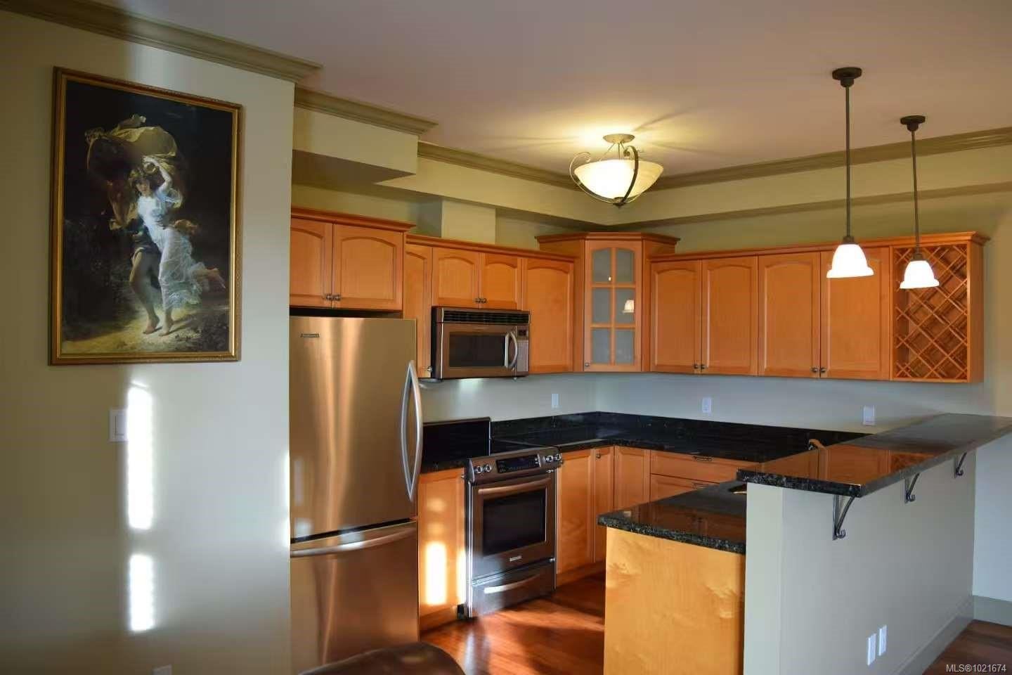 309-1620 Mckenzie Ave, Saanich, BC - Indoor Photo Showing Kitchen With Stainless Steel Kitchen