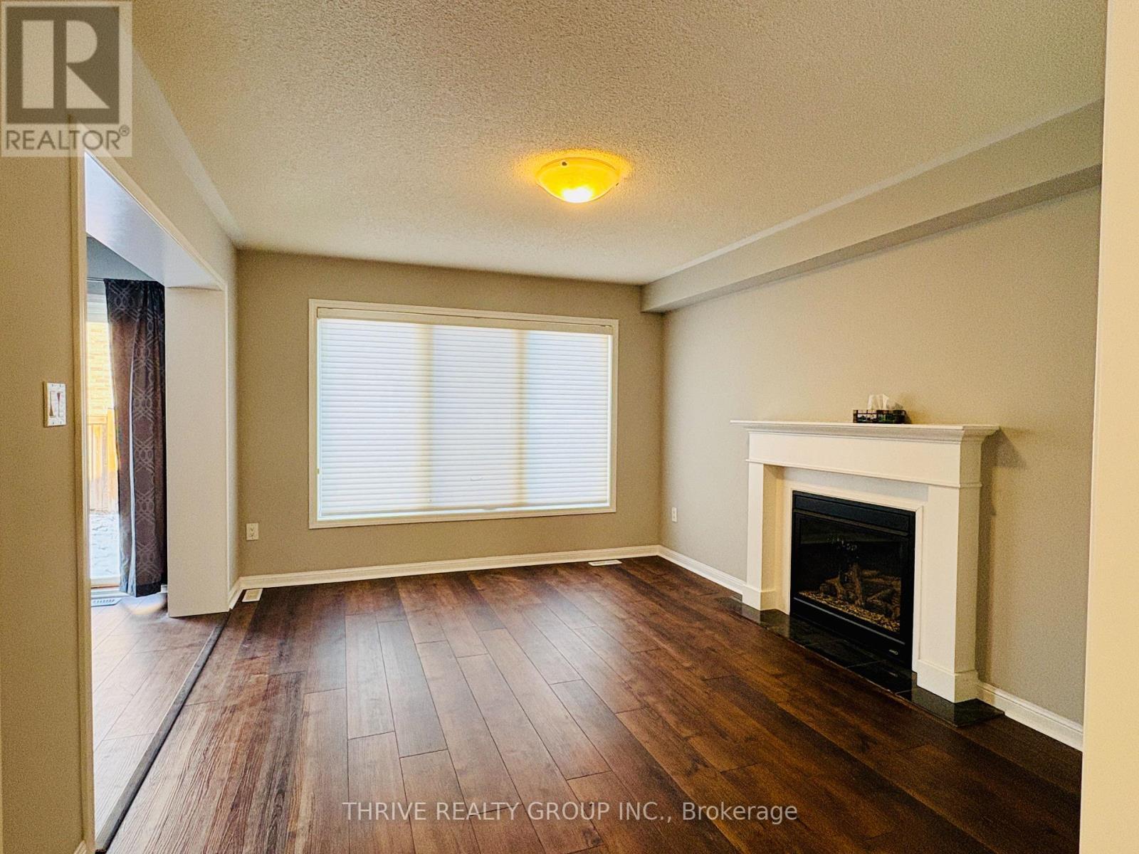 1029 Farmstead. Drive, Milton (Wi Willmott), ON - Indoor With Fireplace