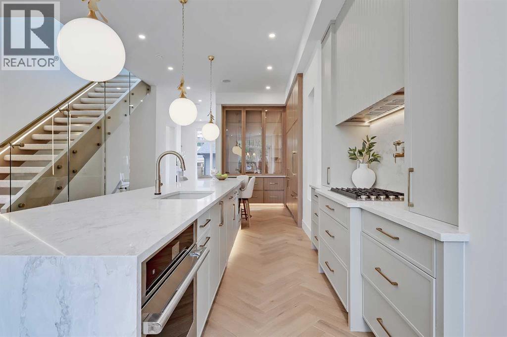 2322 54 Avenue Sw, Calgary, AB - Indoor Photo Showing Kitchen With Upgraded Kitchen