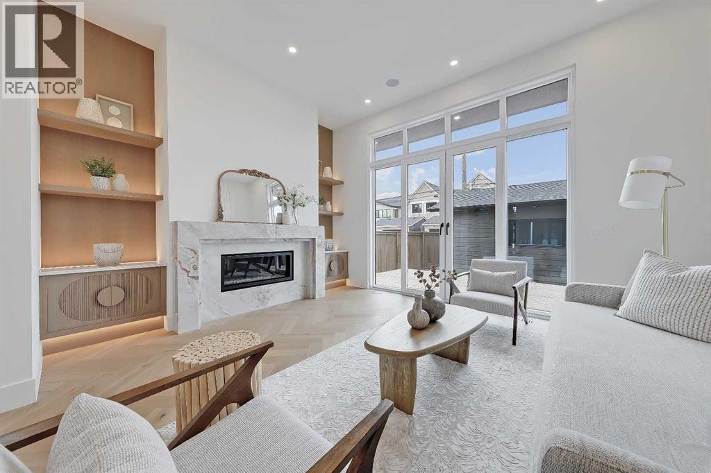2322 54 Avenue Sw, Calgary, AB - Indoor Photo Showing Living Room With Fireplace